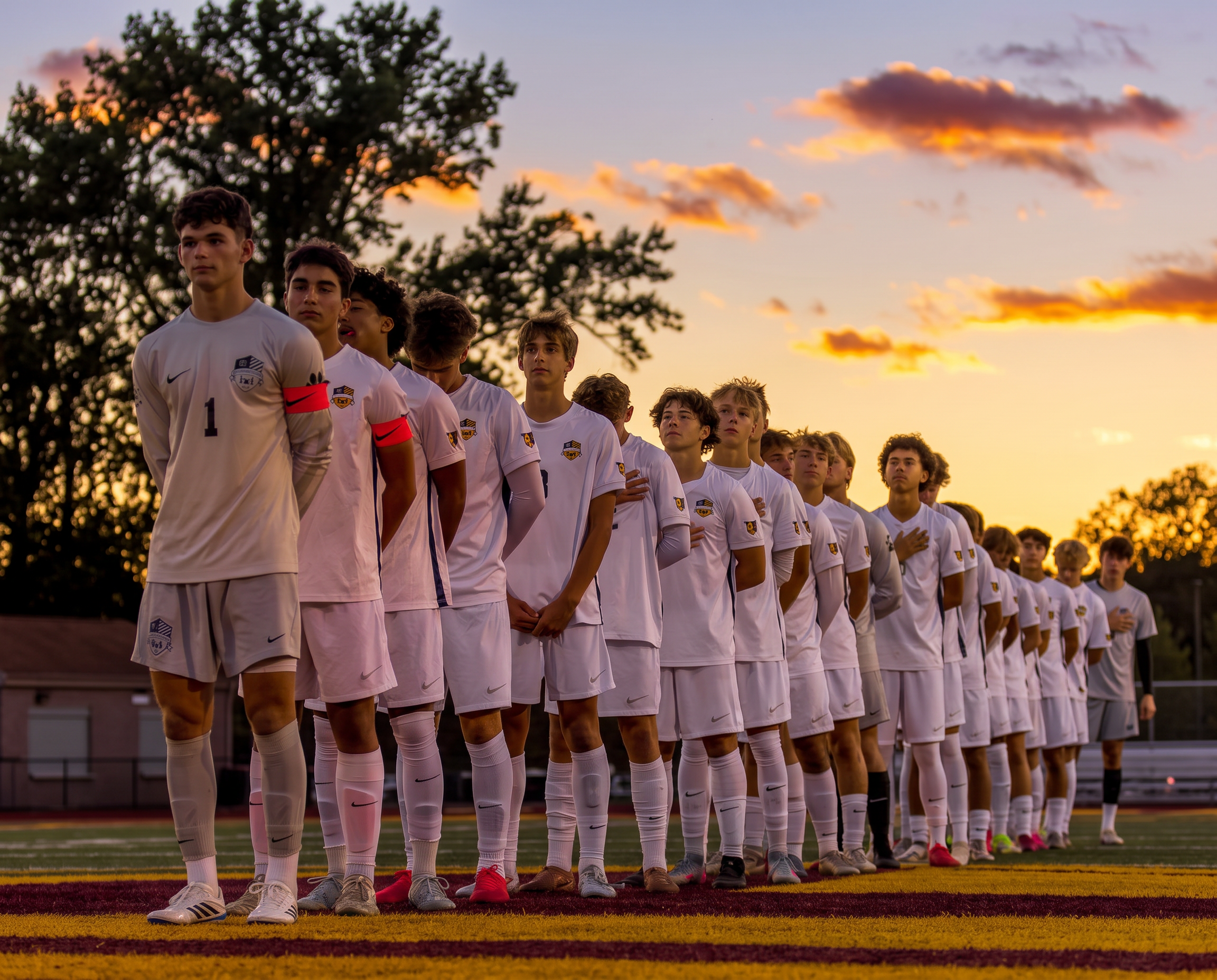 The 2026 St. Ignatius Wildcats lined up for the national anthem at sunset